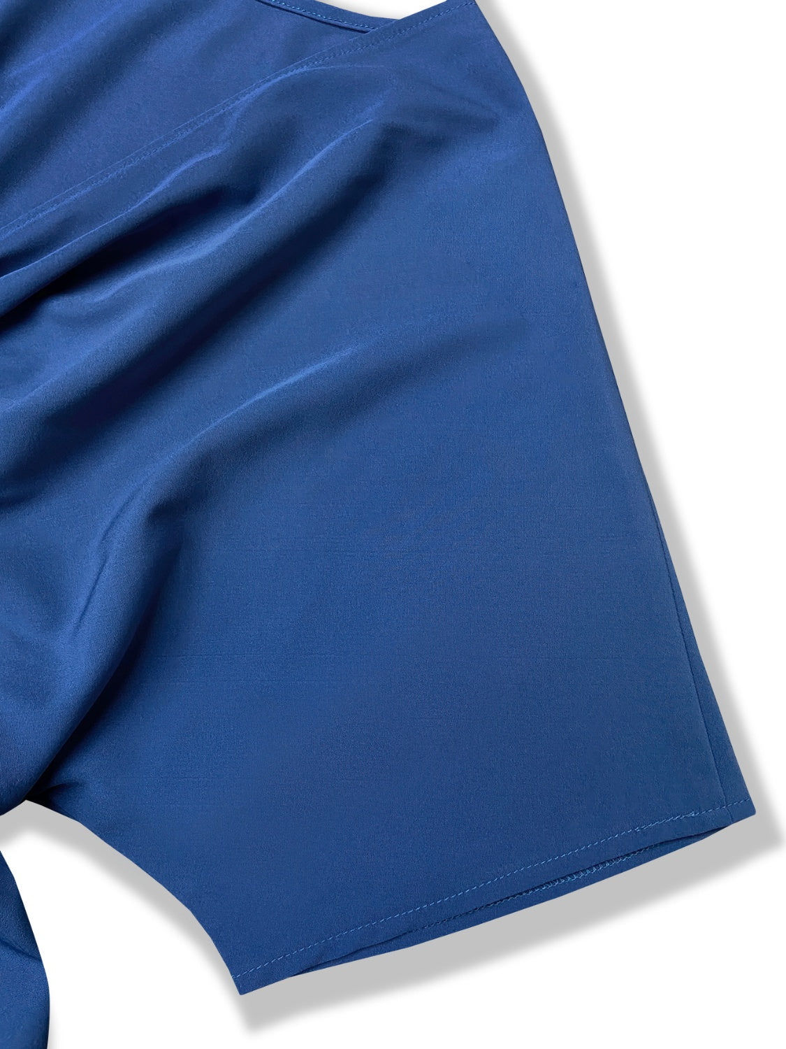 Close up of short sleeve of high low blouse