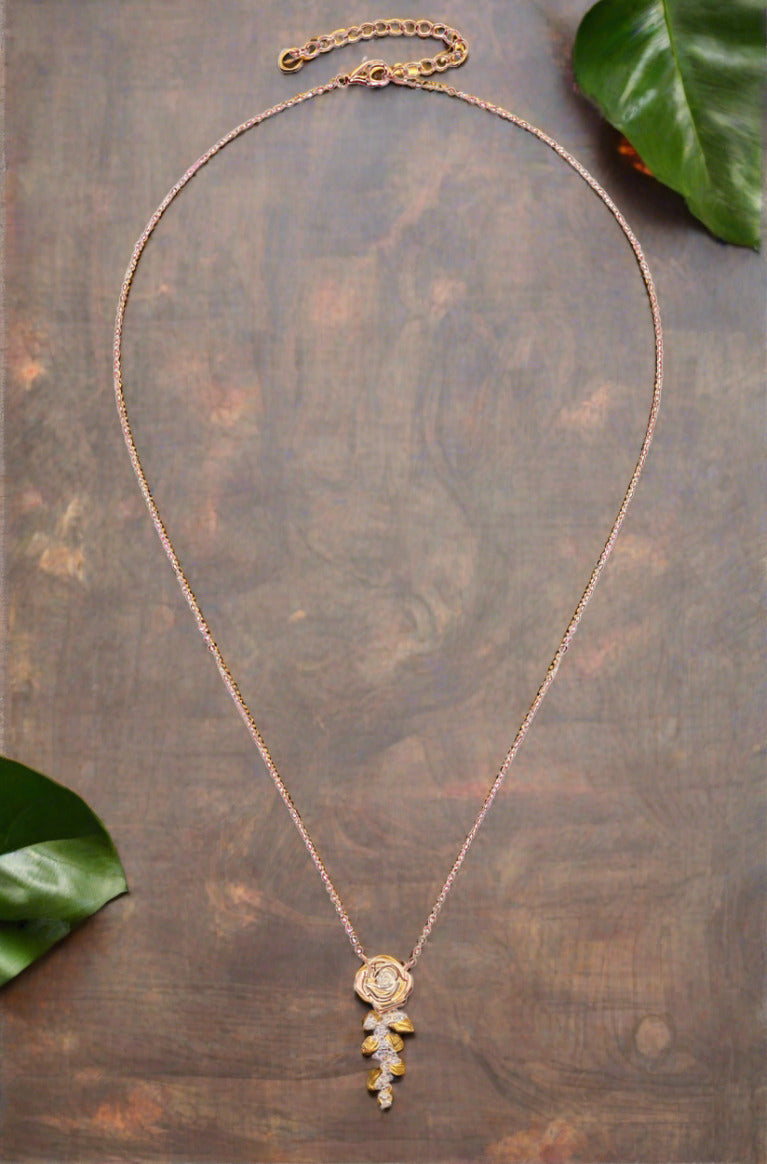 moissanite flower pendant set in 18k rose gold sterling silver