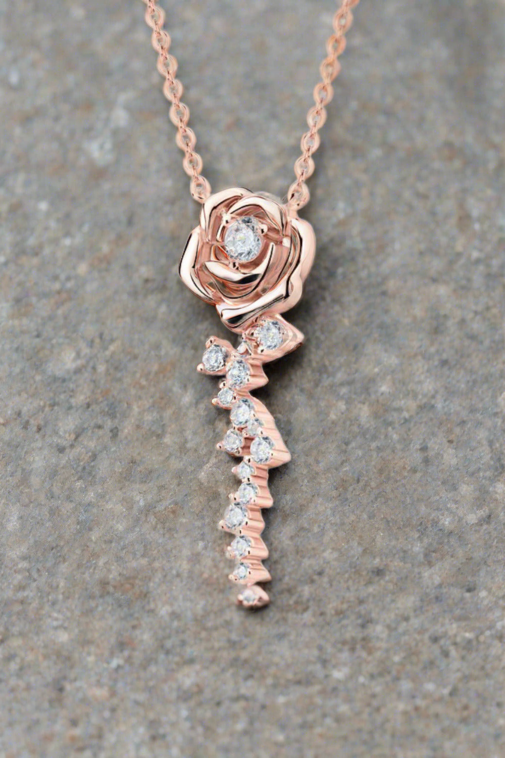 moissanite flower pendant set in 18k rose gold sterling silver