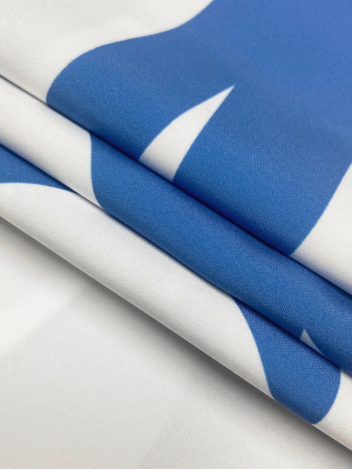 Close up of fabric for blue and white lounge dress