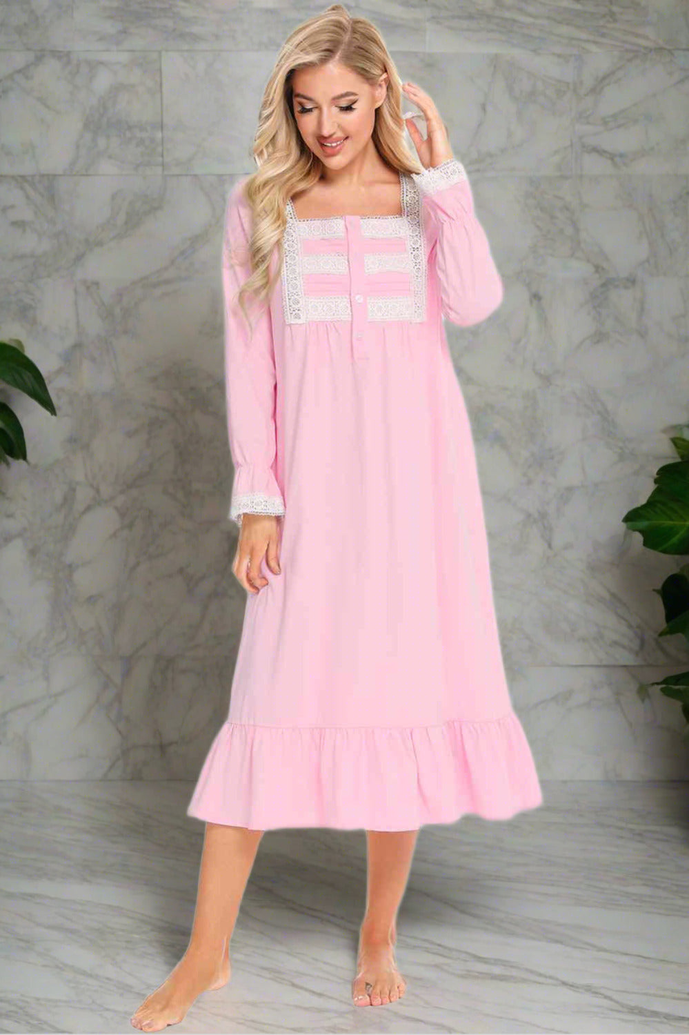Model wearing traditional long sleeve pink nightgown