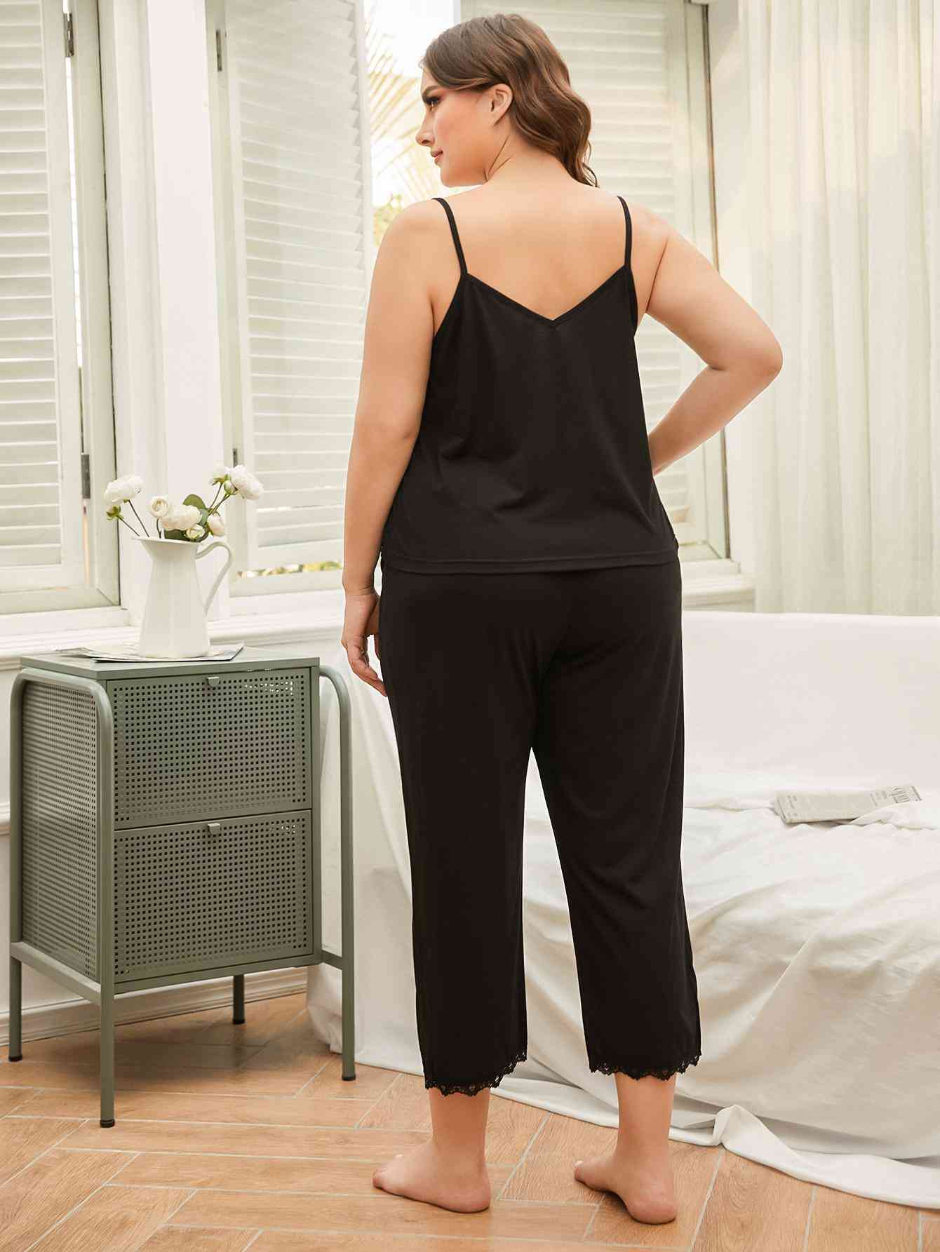 back of Model wearing black spaghetti strap pajama set