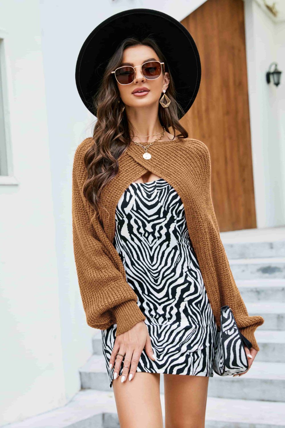 model wearing cropped knitted cover up in brown
