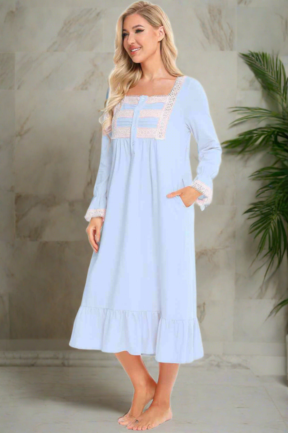 Model wearing traditional long sleeve blue nightgown