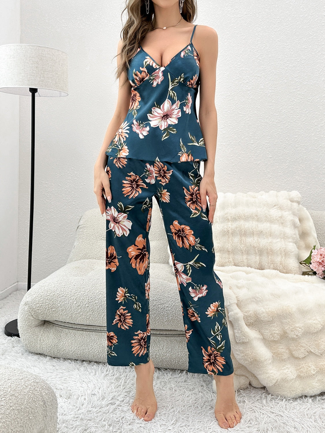 model wearing blue flower print cami and pants lounge set