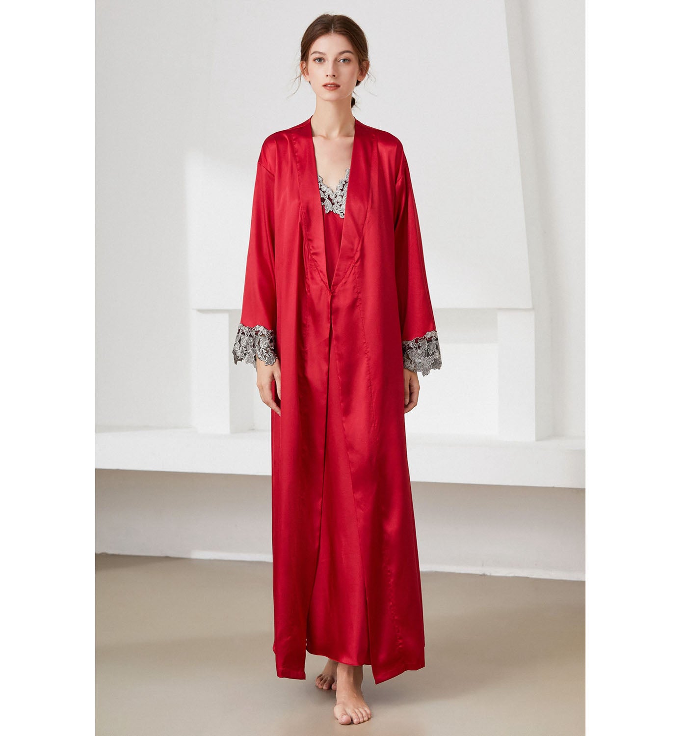 Model wearing red nightgown and robe set with lace trim