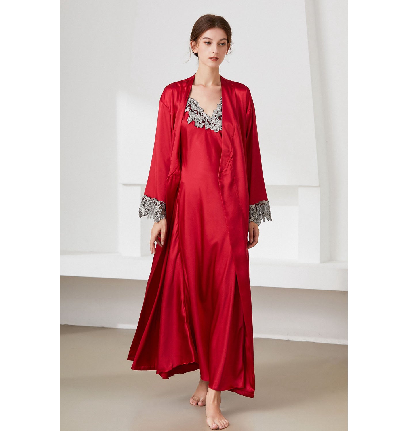 Model wearing red nightgown and robe set with lace trim