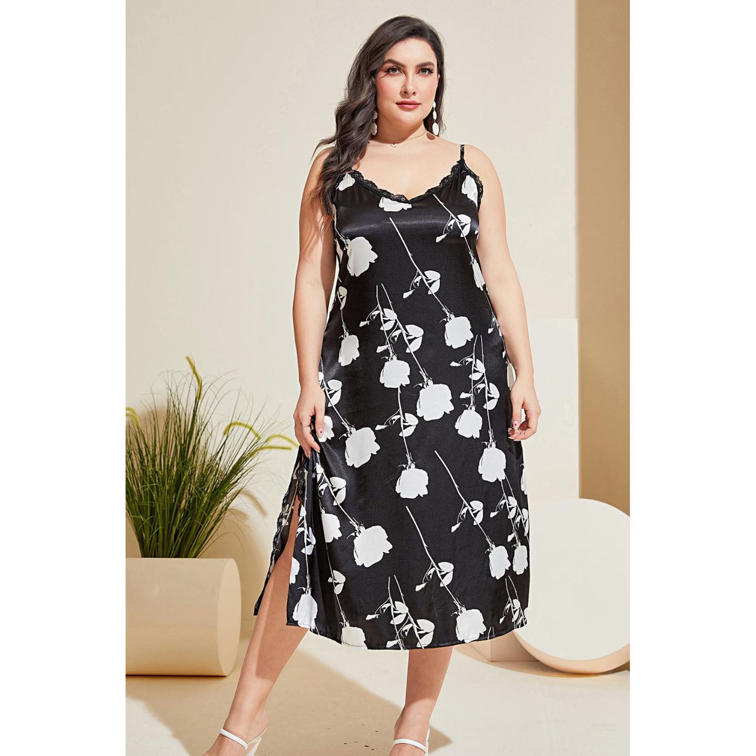 Model wearing black plus size floral pattern nightgown