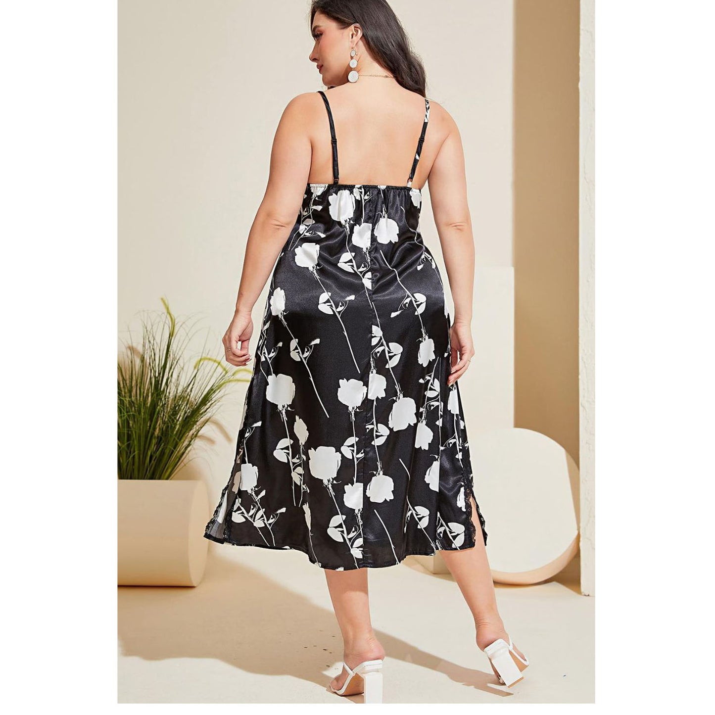 Back of Model wearing black plus size floral pattern nightgown