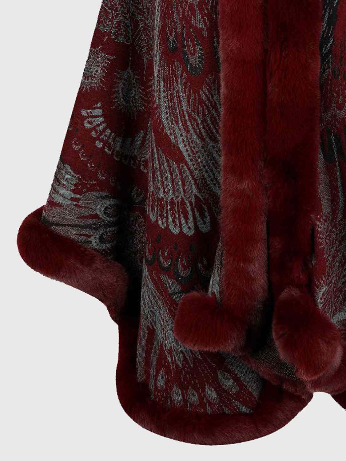 close up of Printed open front poncho with faux fur trim