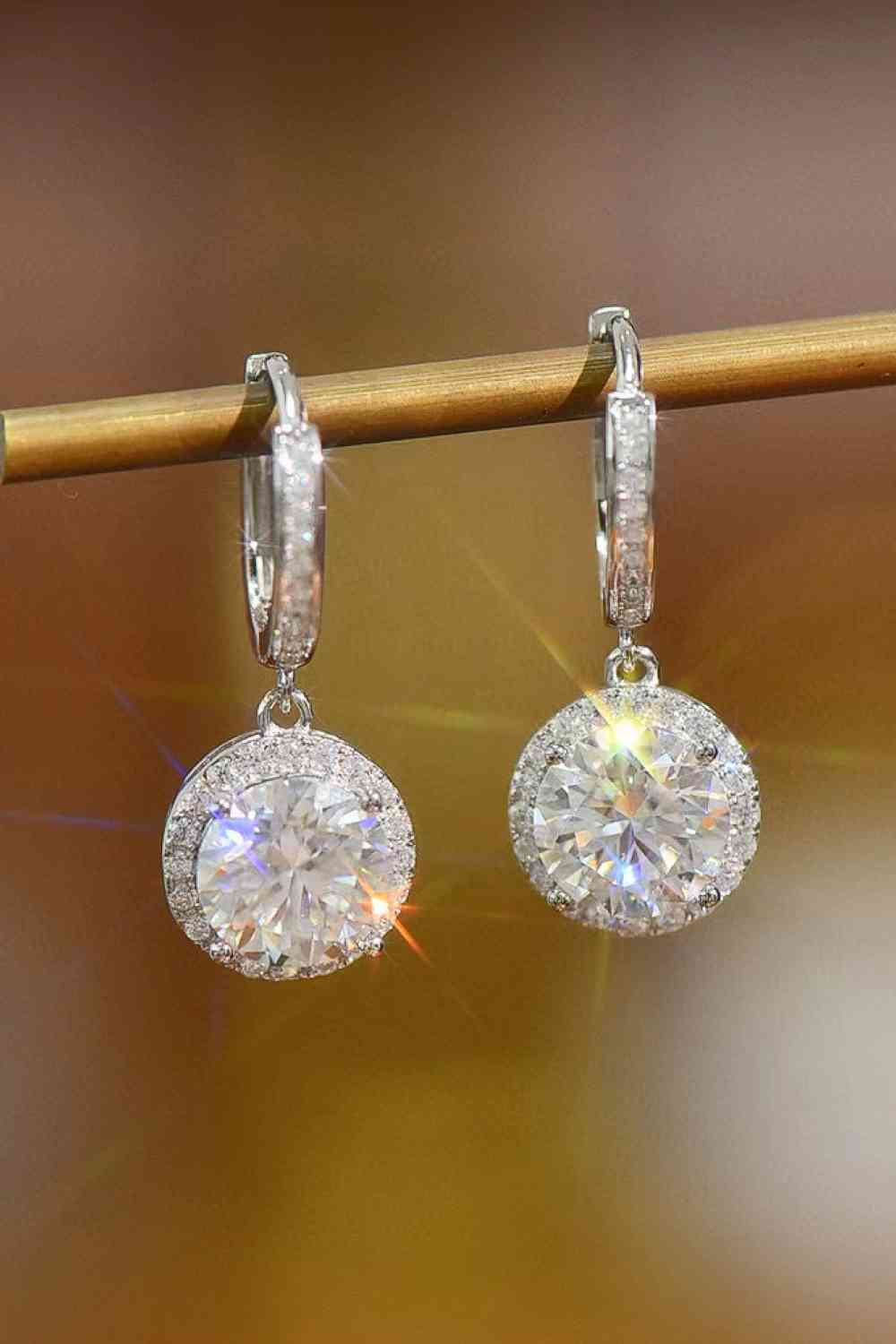 Clear moissanite stone earrings set in platinum plated sterling silver
