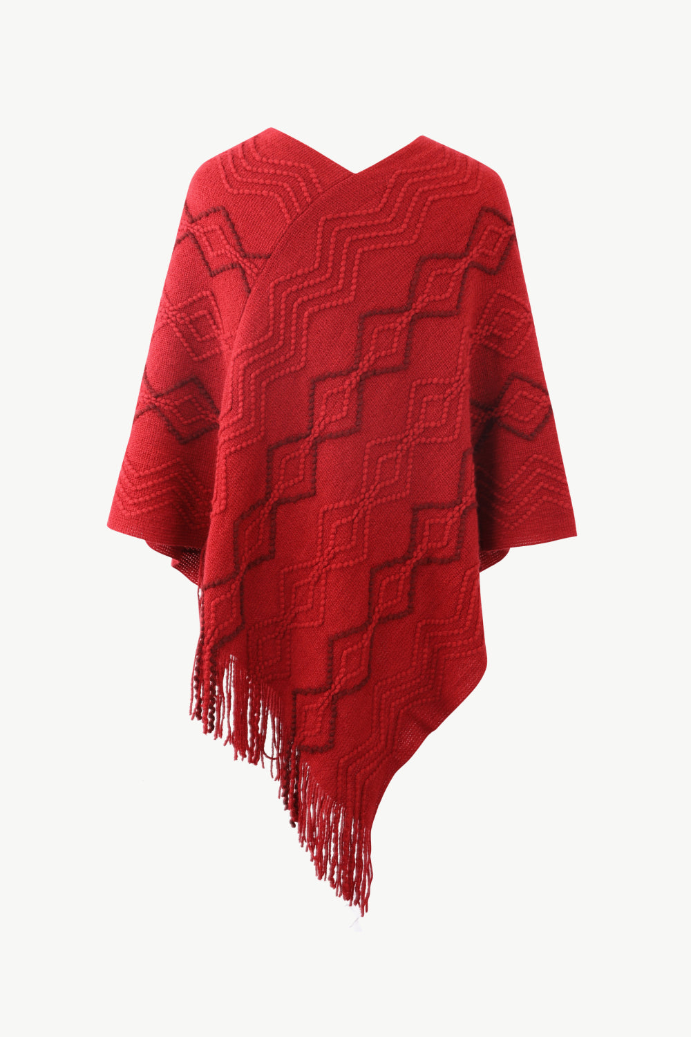 Back of Red poncho with faux pearl and fringe trim