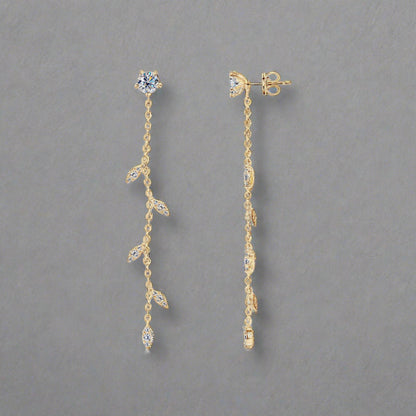 Moissanite drop earrings set in gold plated sterling leaf setting