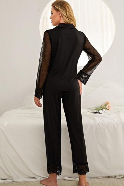 Back of model standing wearing black pajama set with lace arms