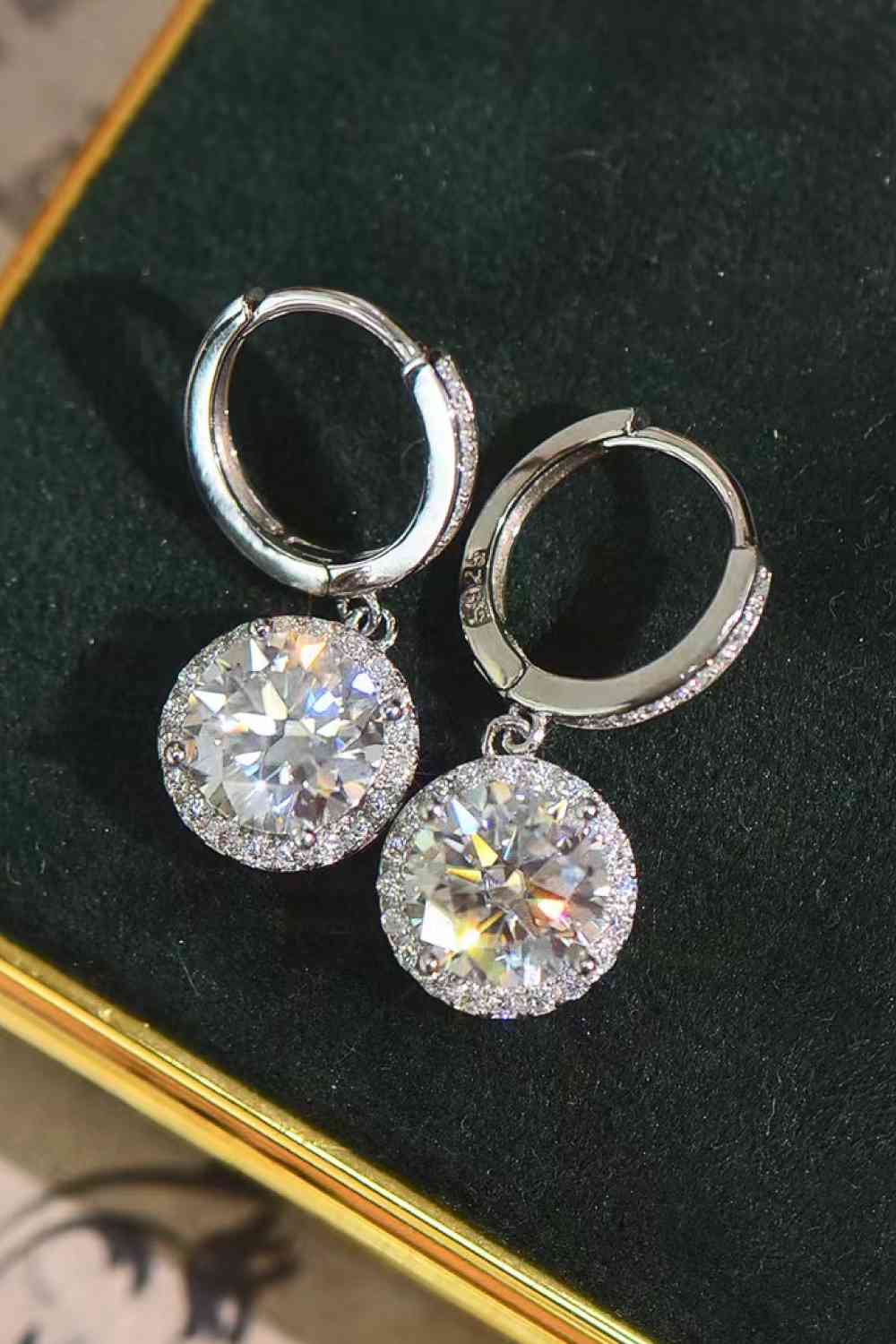 Clear moissanite stone earrings set in platinum plated sterling silver