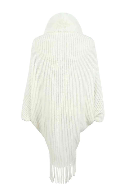 Back of ivory open front poncho with fringe and faux fur trim