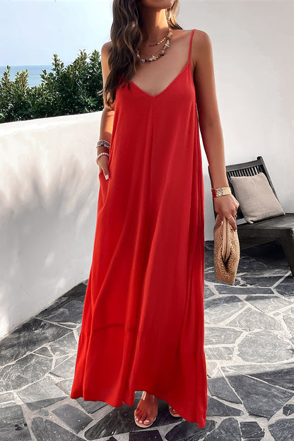 Model standing outside wearing red spaghetti strap loungedress
