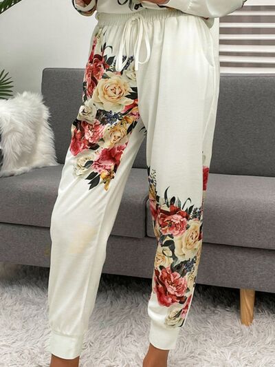 Close up of white pajama pants with flower print
