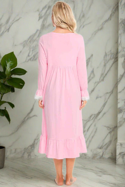 Back of Model wearing traditional long sleeve pink nightgown