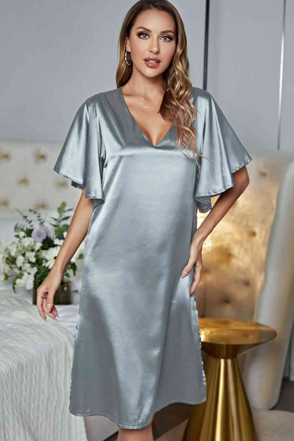Model wearing silver knee length nightgown
