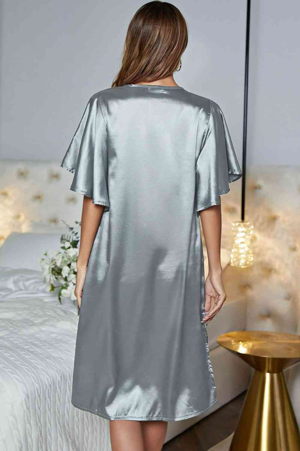 back of Model wearing silver knee length nightgown