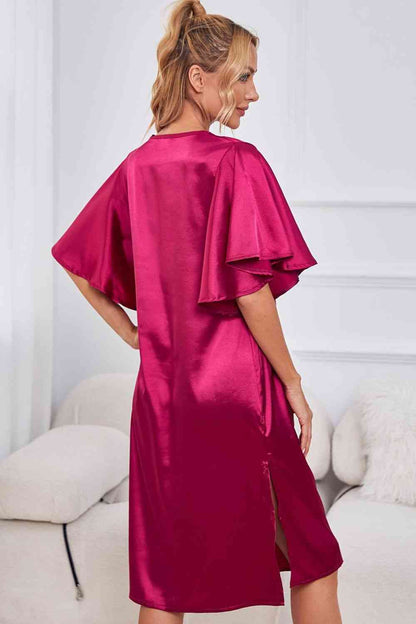 back of Model wearing pink knee length nightgown
