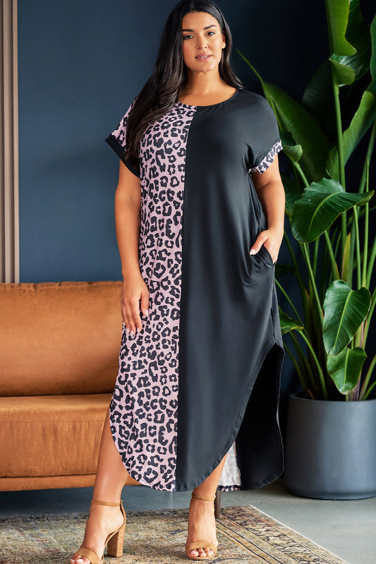 Model wearing plus size short sleeve black and leopard lounge dress
