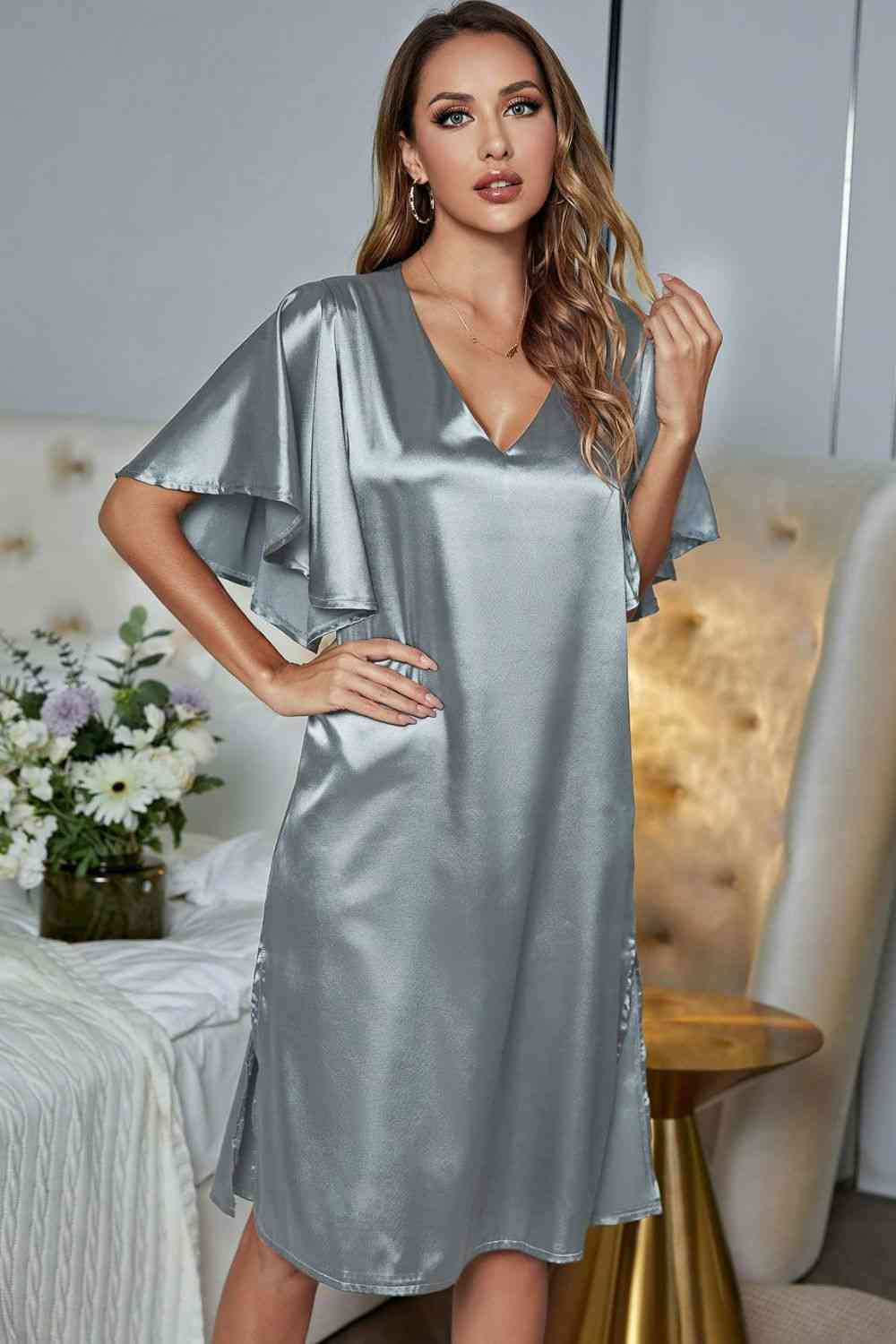 Model wearing silver knee length nightgown