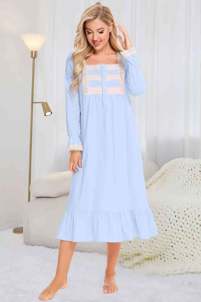 Model wearing traditional long sleeve blue nightgown