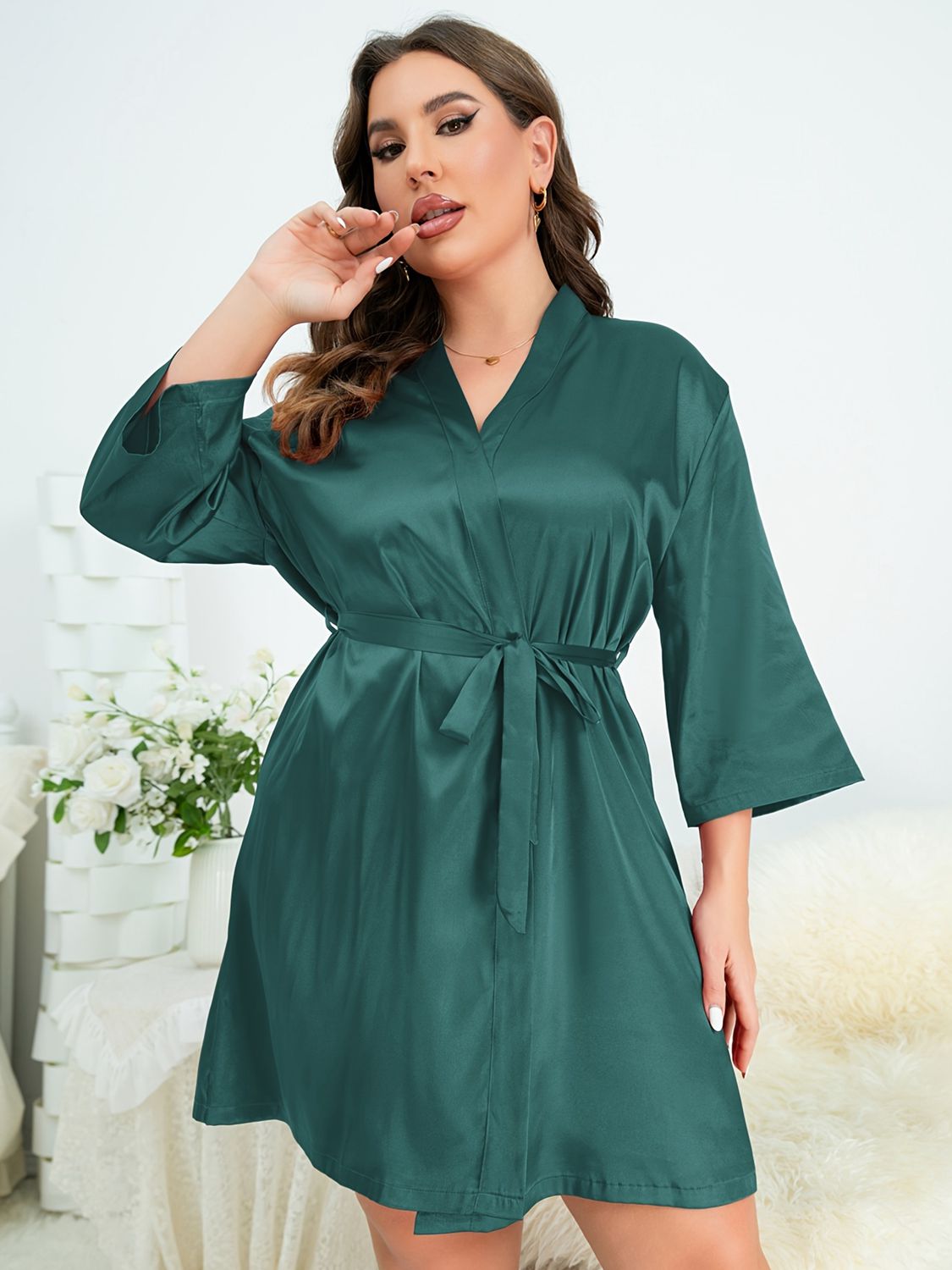 Model wearing green plus size robe