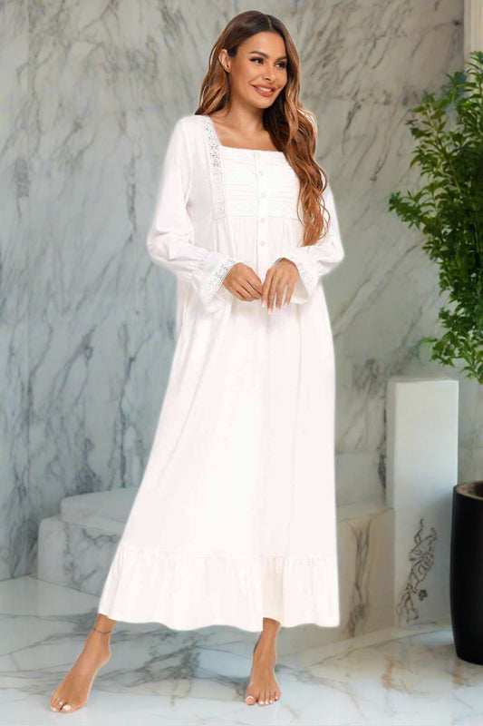 Model wearing traditional long sleeve white nightgown
