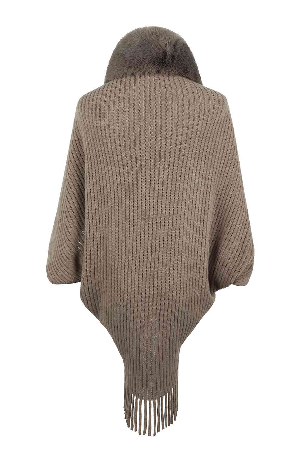 Back of chocolate open front poncho with fringe and faux fur trim