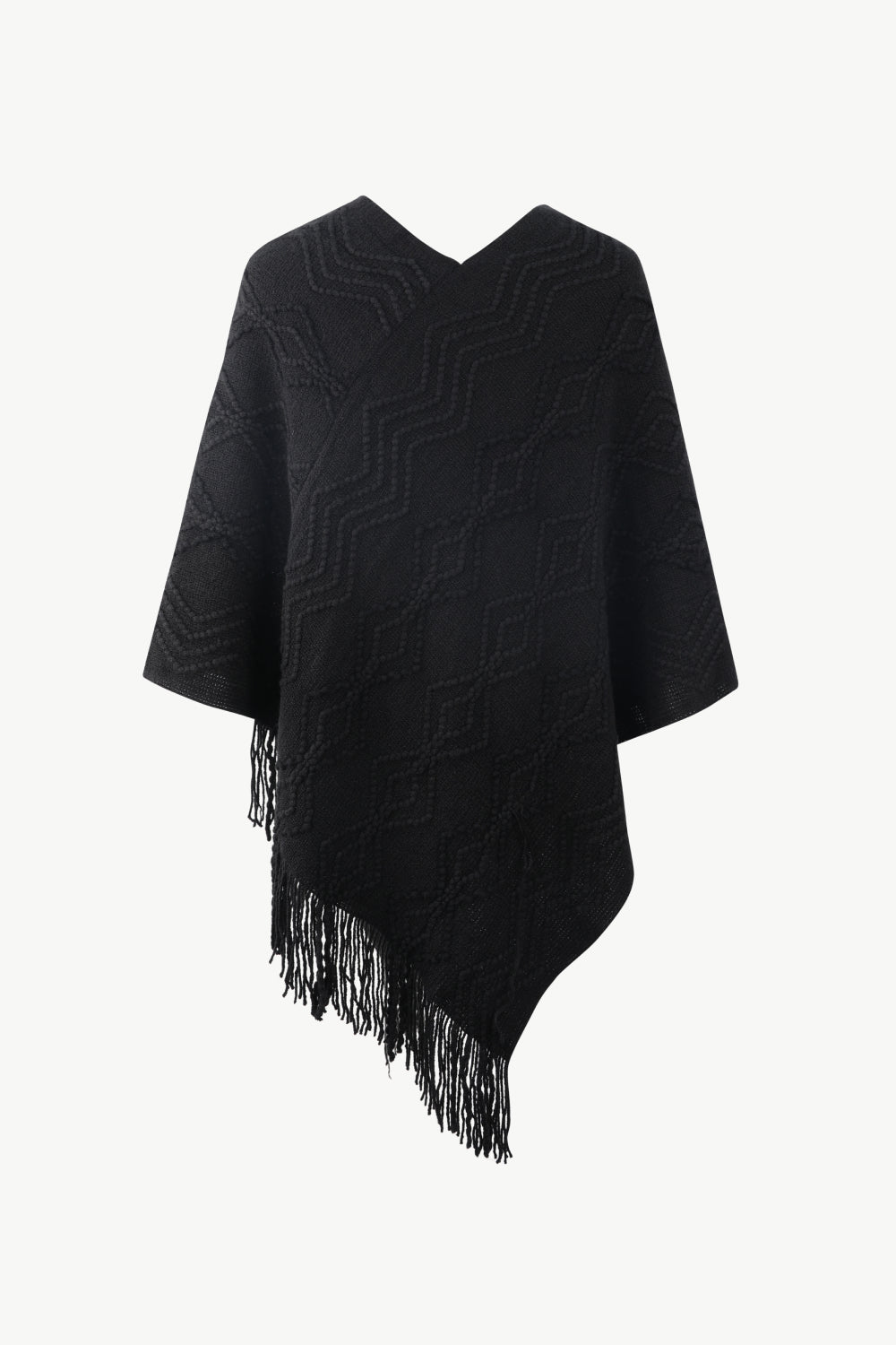 Back of Black poncho with faux pearl and fringe trim