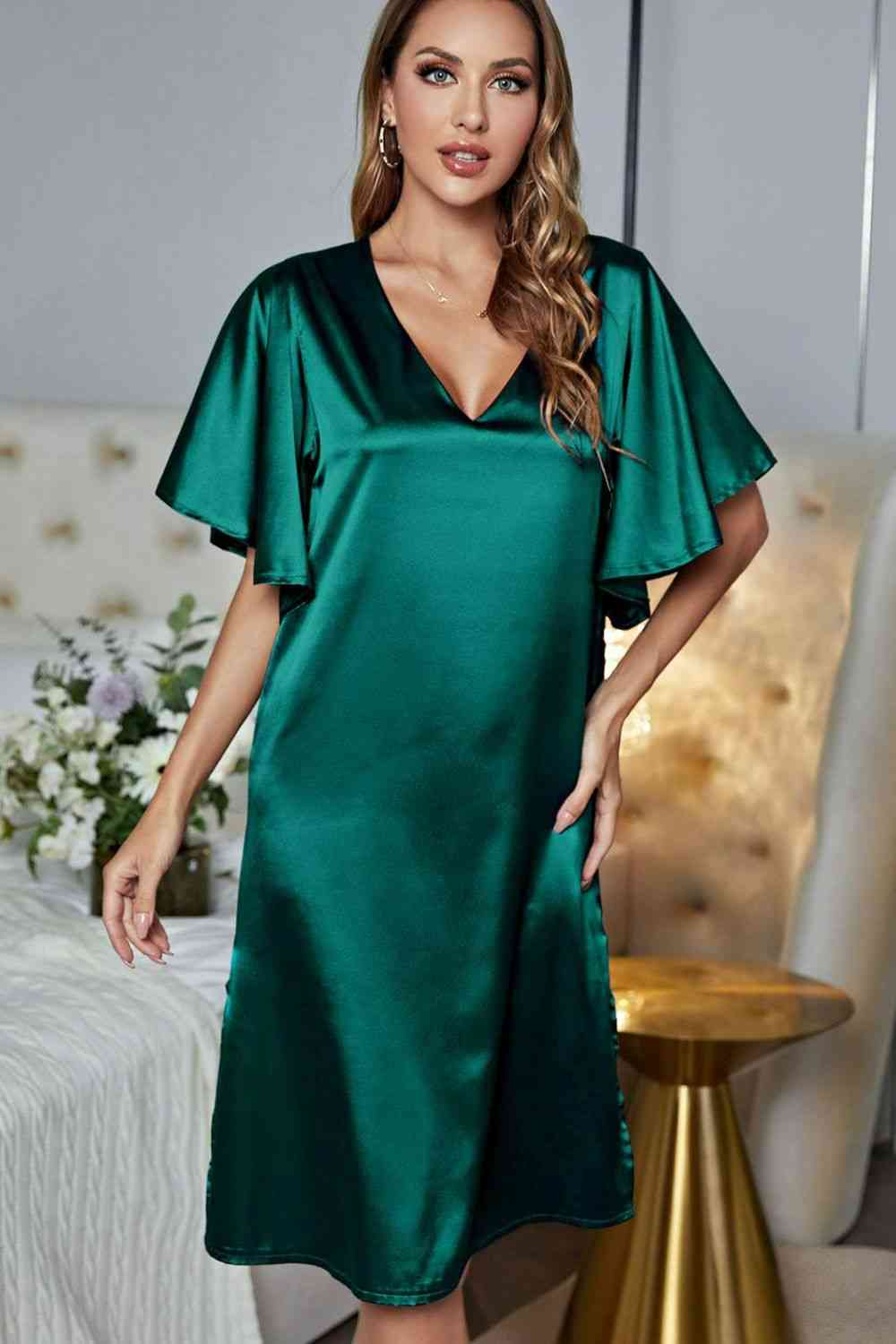 Model wearing green knee length nightgown