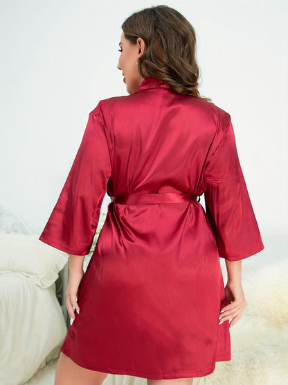 Back of model wearing red plus size robe