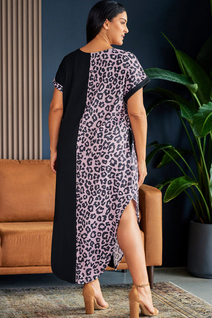 Back of model wearing plus size short sleeve black and leopard lounge dress