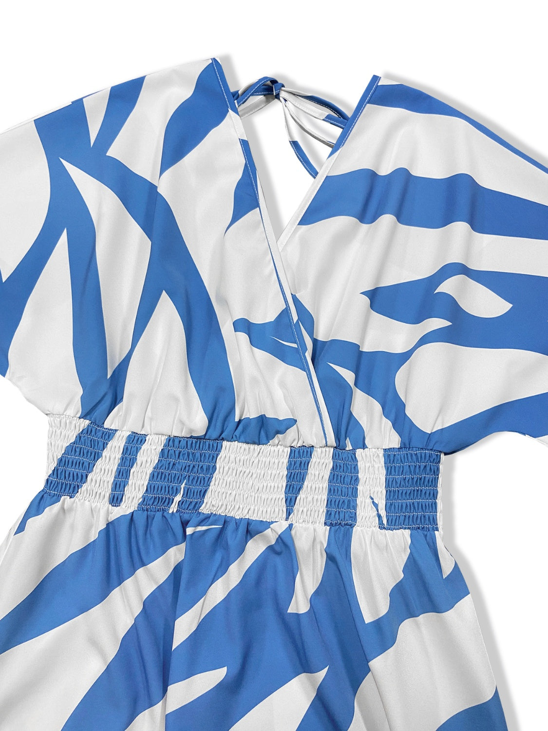 Close up of top of blue and white lounge dress