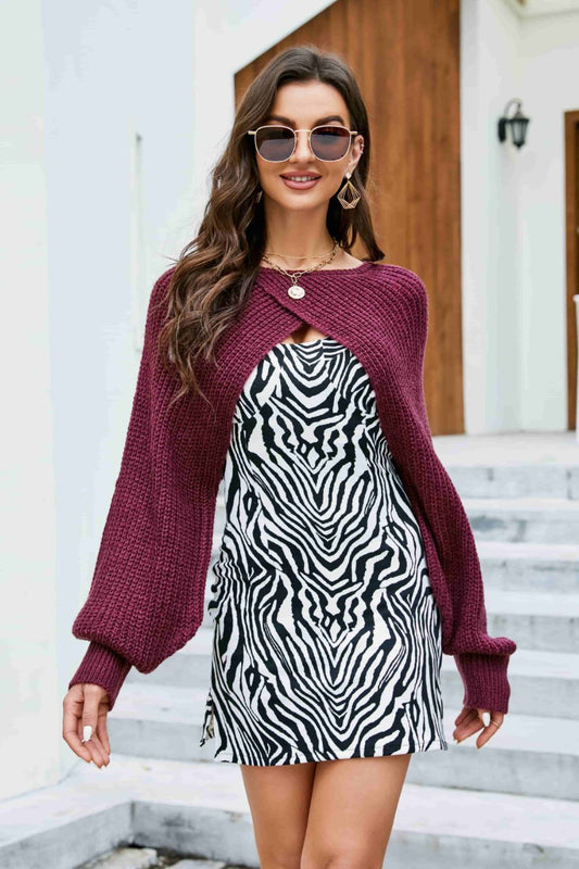 model wearing cropped knitted cover up in wine
