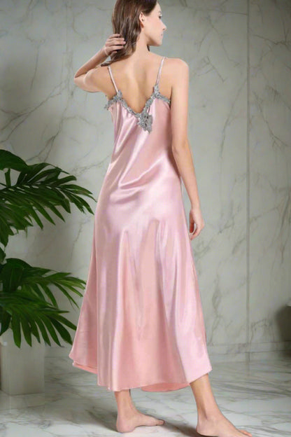 Back of Model wearing pink nightgown with lace trim