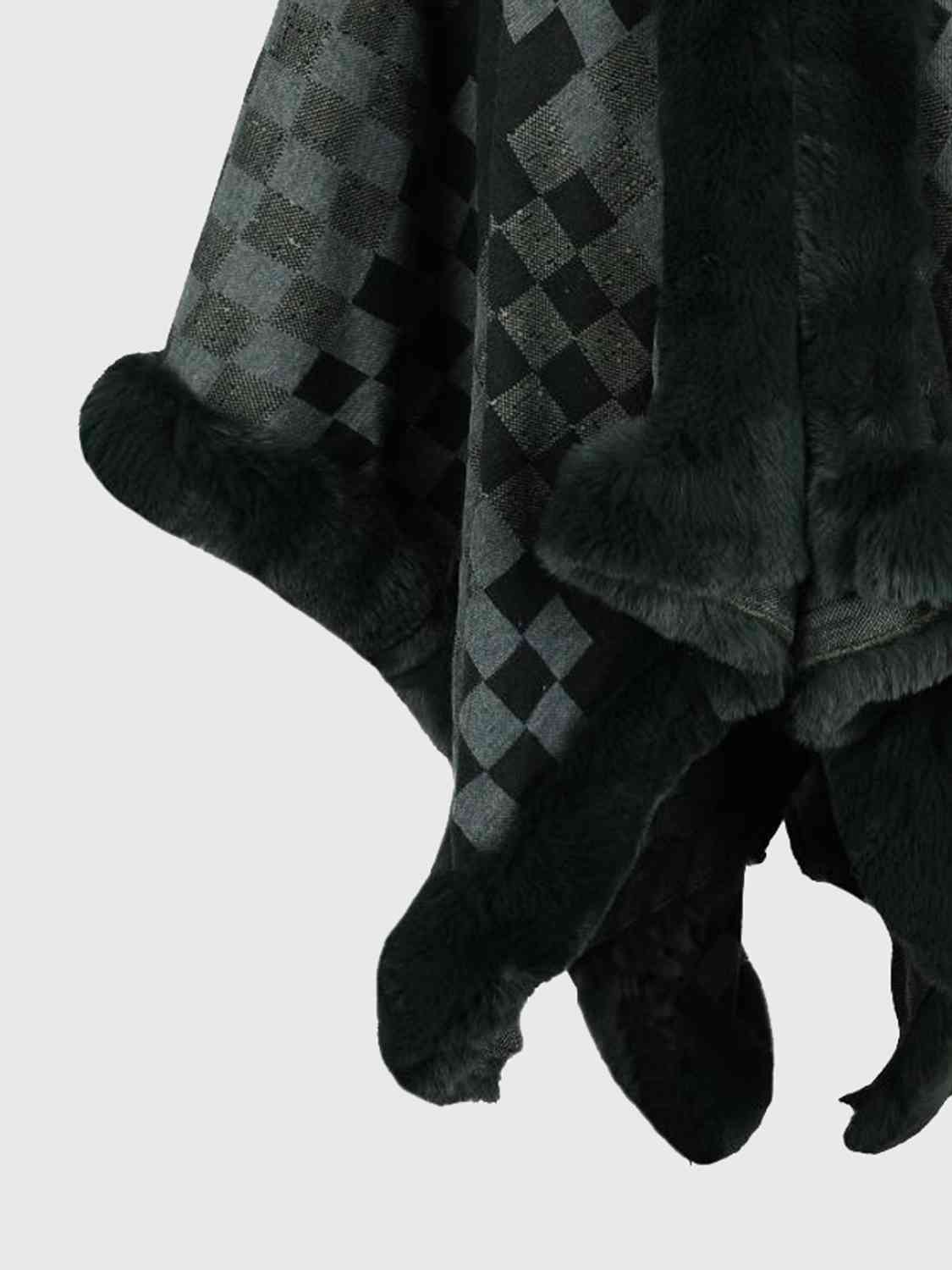close up checkered poncho with faux fur trim