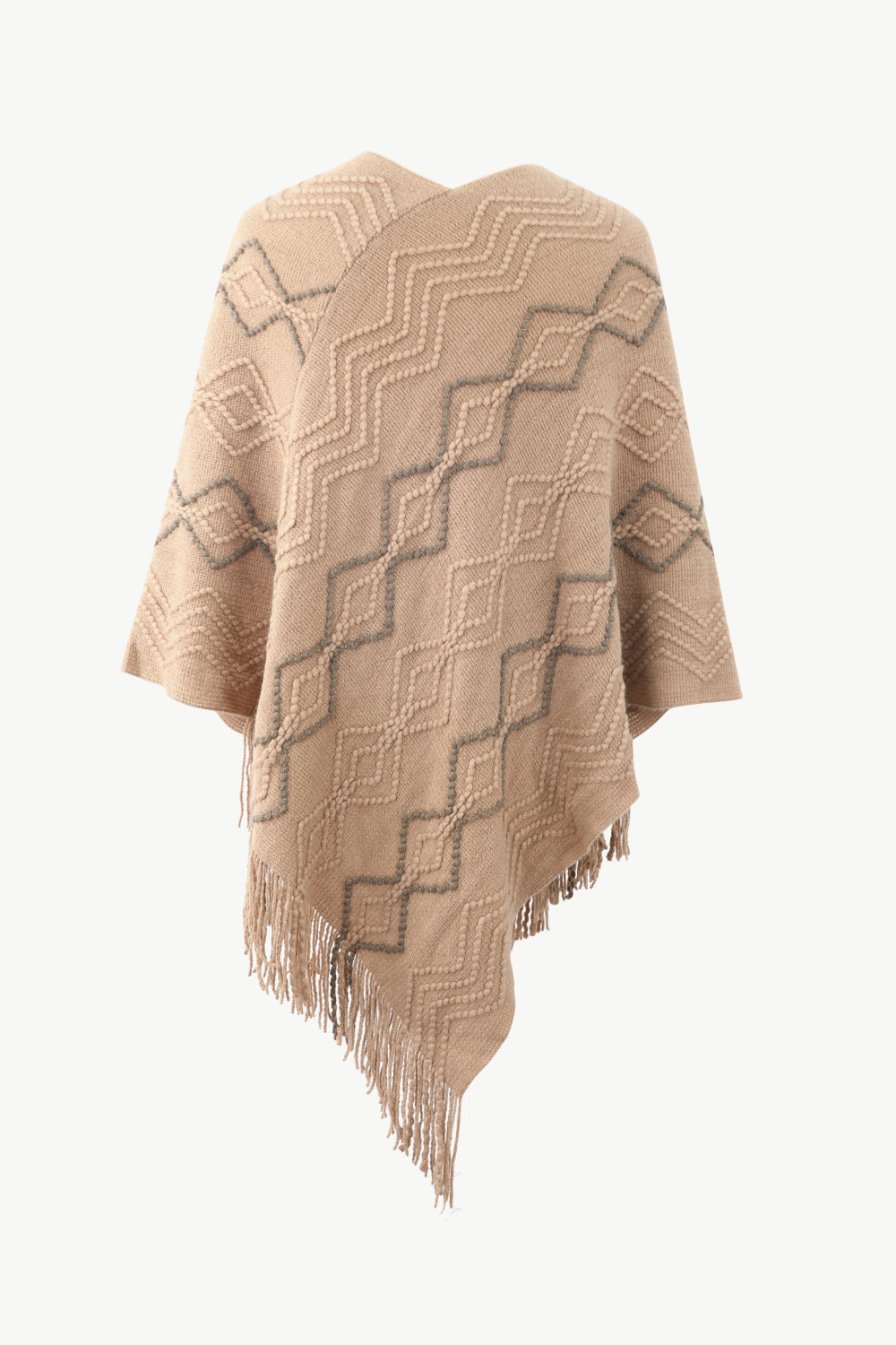 Back of Beige poncho with faux pearl and fringe trim